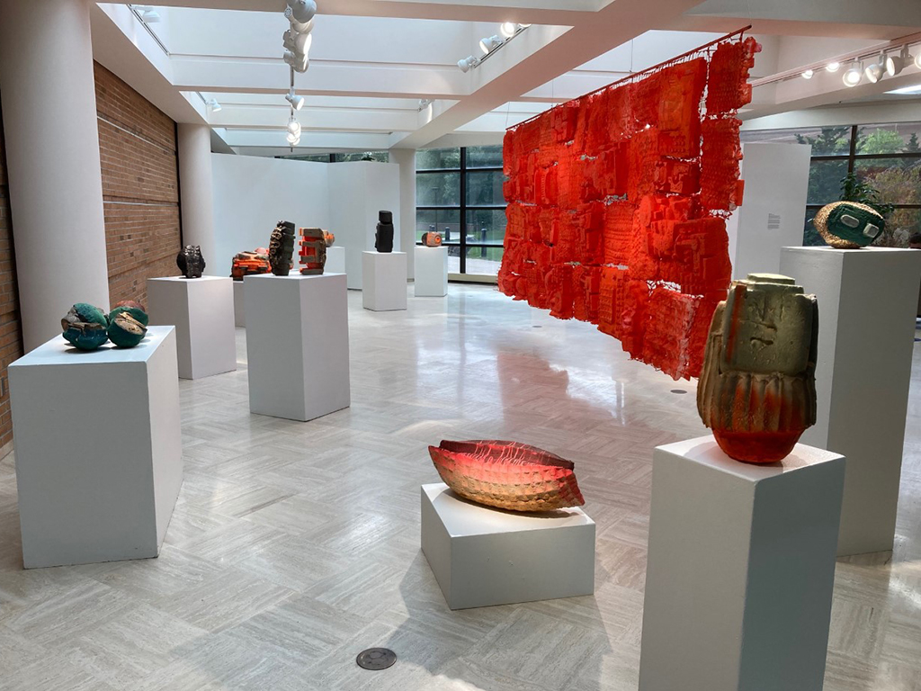 back side of wall installation with sculptures